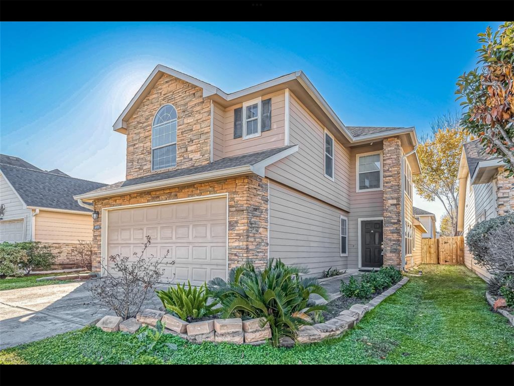 10819 Waterfern Court Houston, TX 77064 - Photo 2 of 37 a view of a house with a yard
