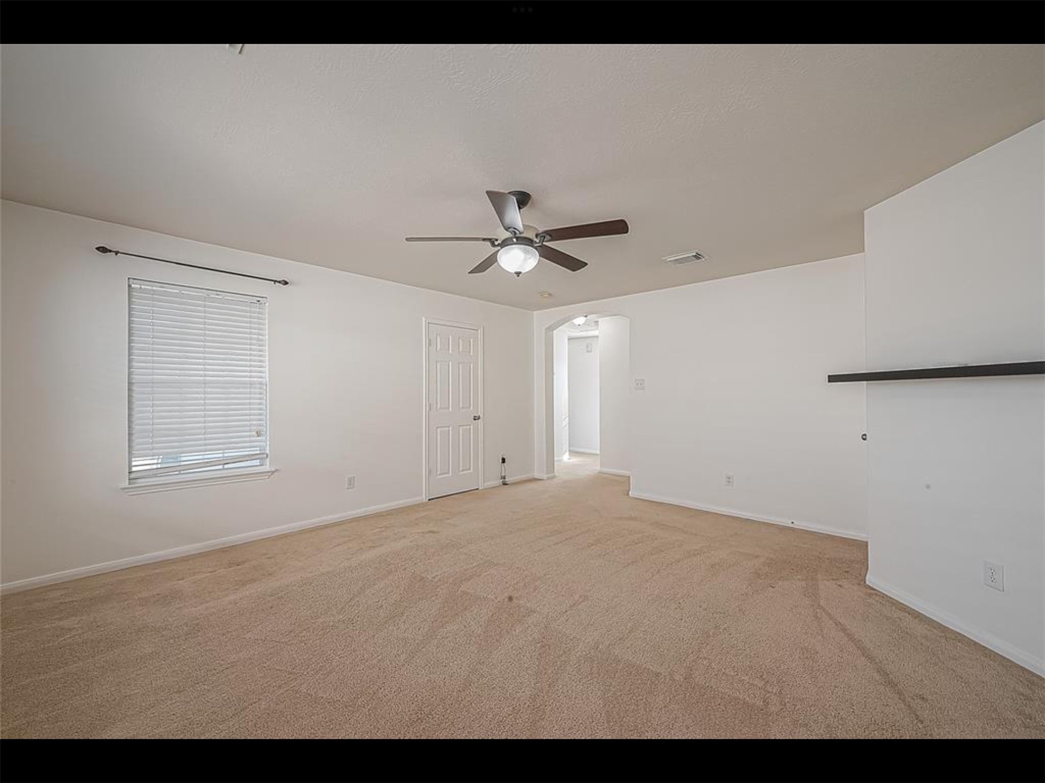 10819 Waterfern Court Houston, TX 77064 - Photo 23 of 37 a view of an empty room with a window