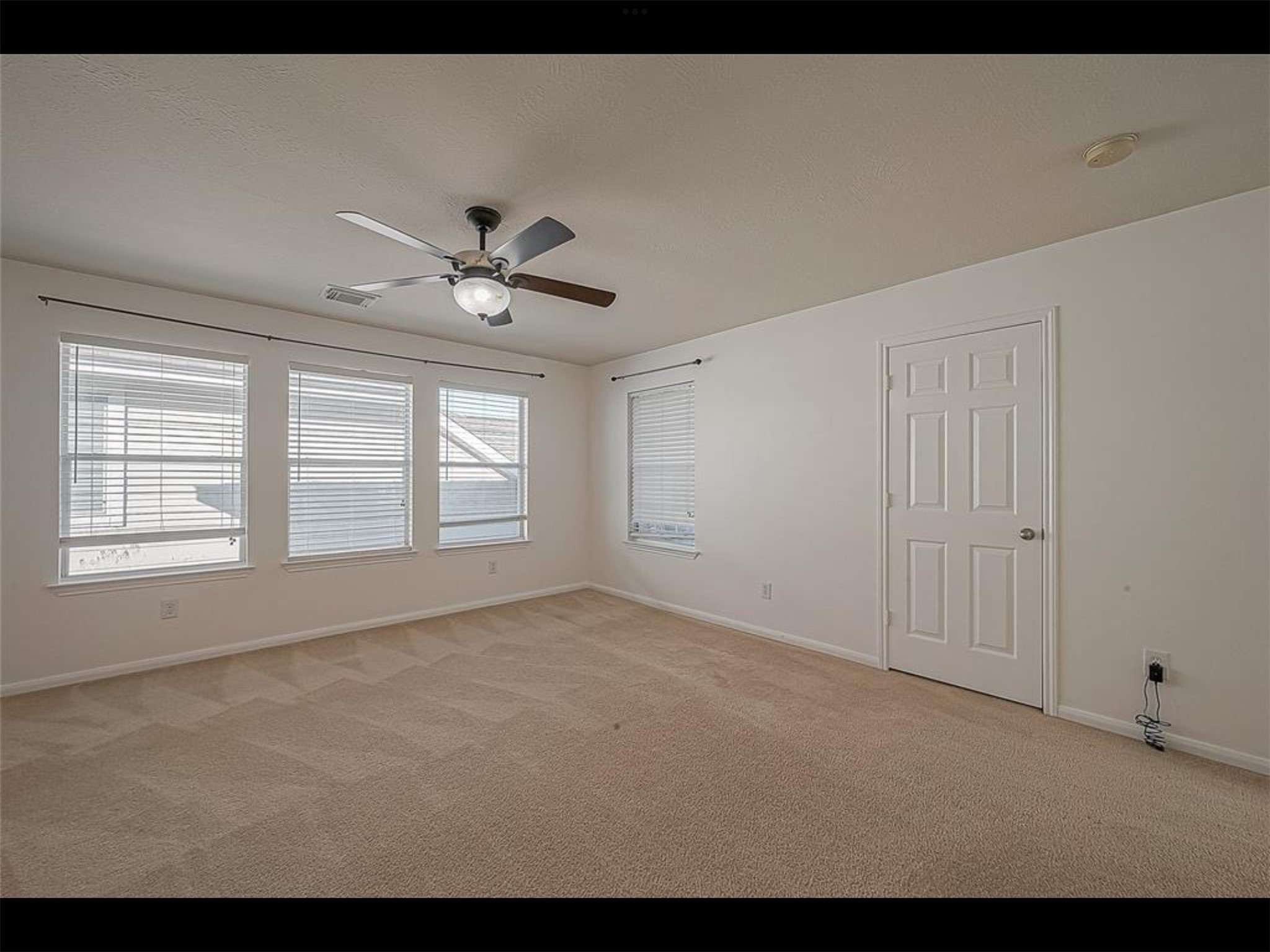 10819 Waterfern Court Houston, TX 77064 - Photo 24 of 37 a view of an empty room with a window
