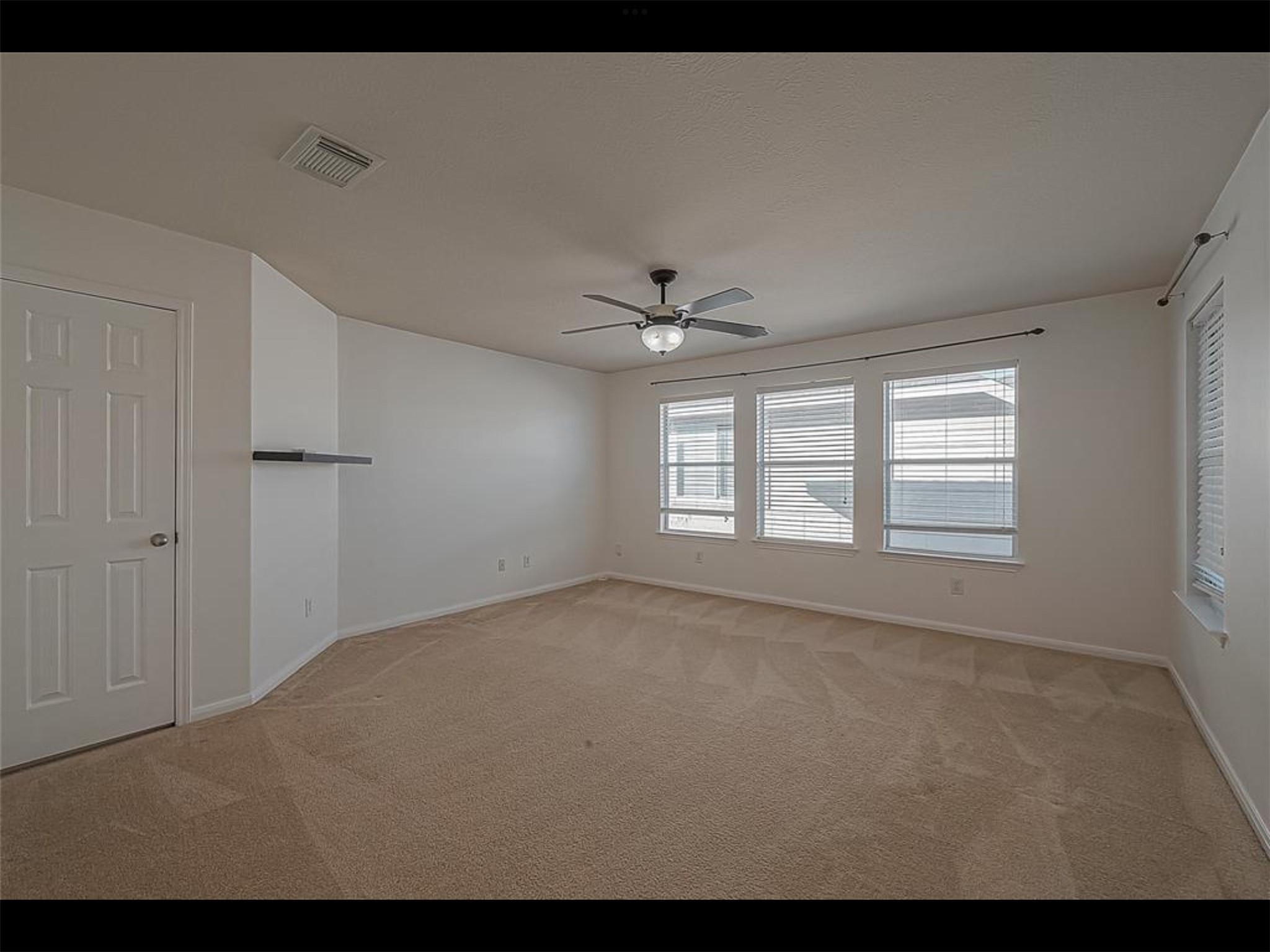 10819 Waterfern Court Houston, TX 77064 - Photo 25 of 37 a view of an empty room with a window