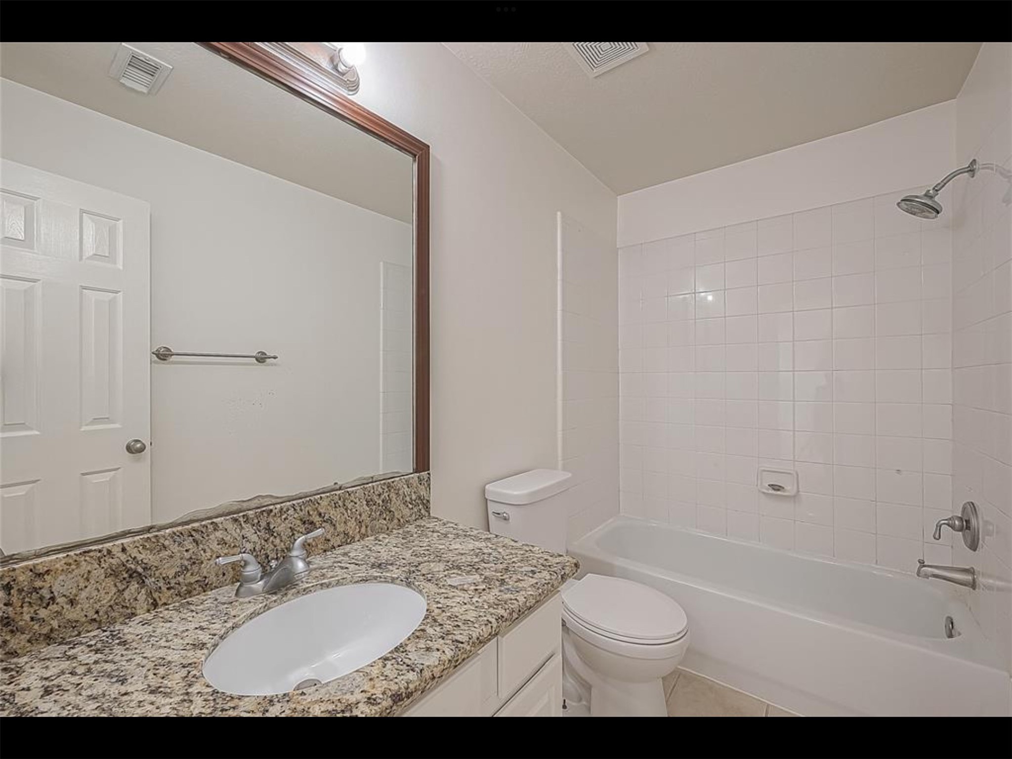 10819 Waterfern Court Houston, TX 77064 - Photo 26 of 37 a bathroom with a granite countertop sink toilet and shower