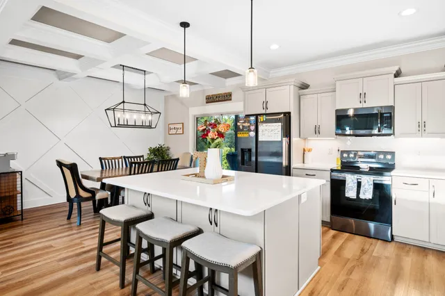 a kitchen with a sink and a window