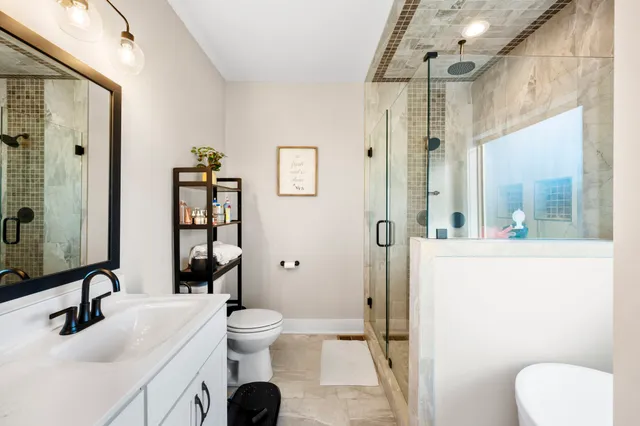 a bedroom with furniture and a bed