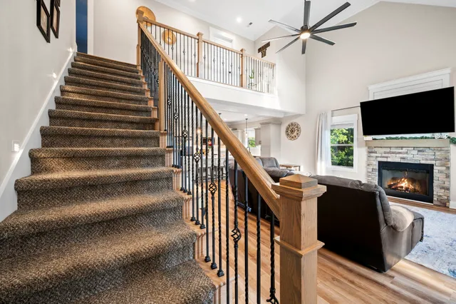 an aerial view of residential house with outdoor space and swimming pool