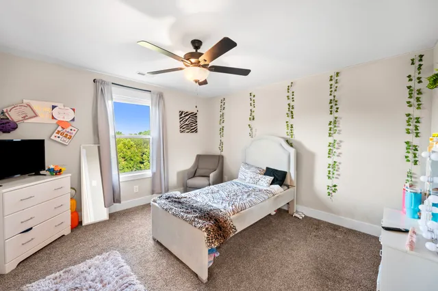 an aerial view of residential house with an outdoor space