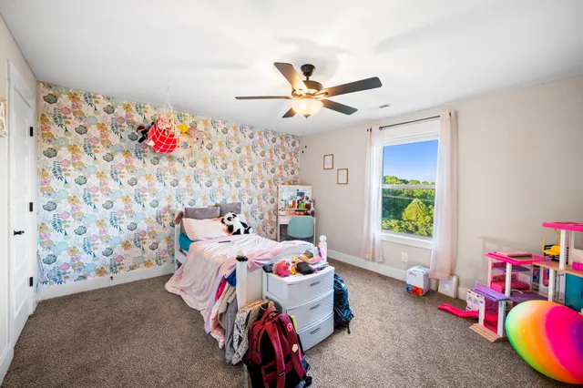 a view of a swimming pool with an outdoor space