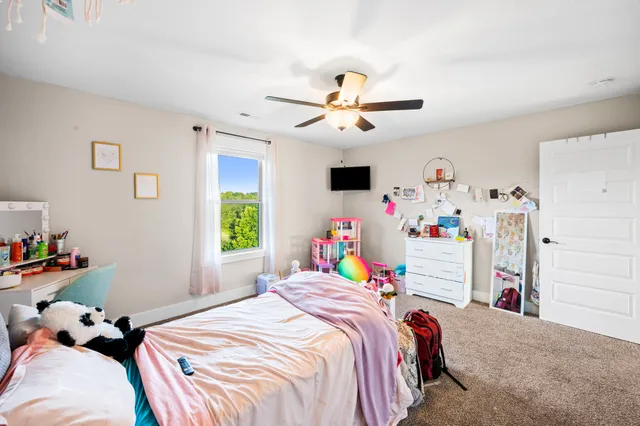 a front view of a house with yard