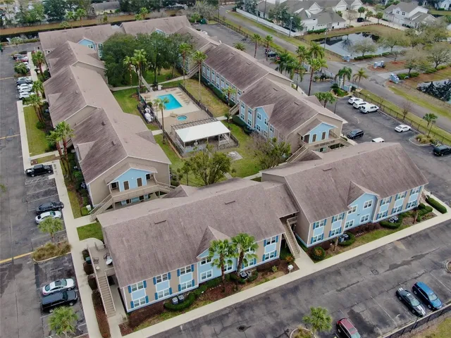 an aerial view of a house with a garden