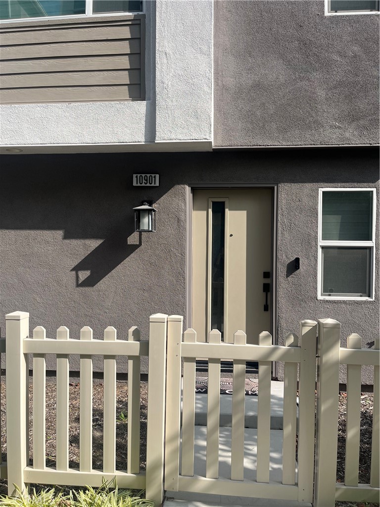 10901 Montauk Lane Stanton, CA 90680 - Photo 2 of 21 a front view of a house with balcony