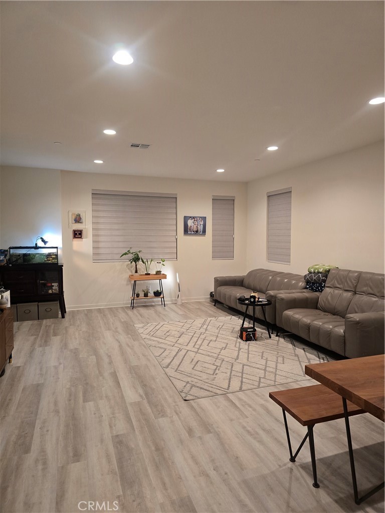 10901 Montauk Lane Stanton, CA 90680 - Photo 3 of 21 a living room with furniture and a table