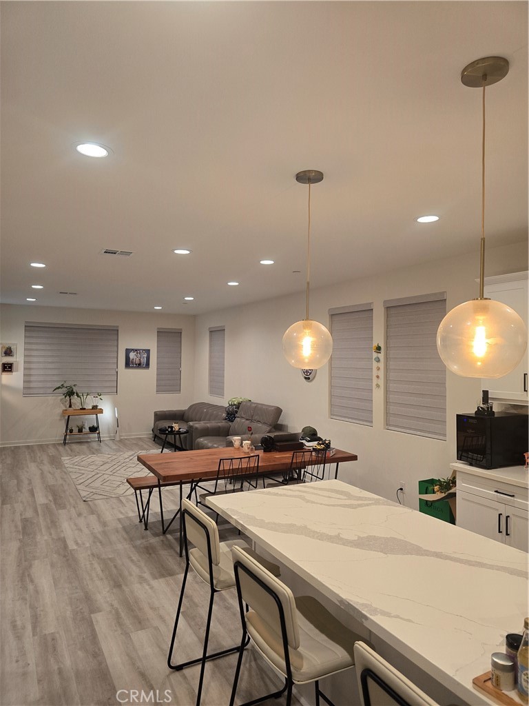 10901 Montauk Lane Stanton, CA 90680 - Photo 6 of 21 a kitchen with a table and chairs in it