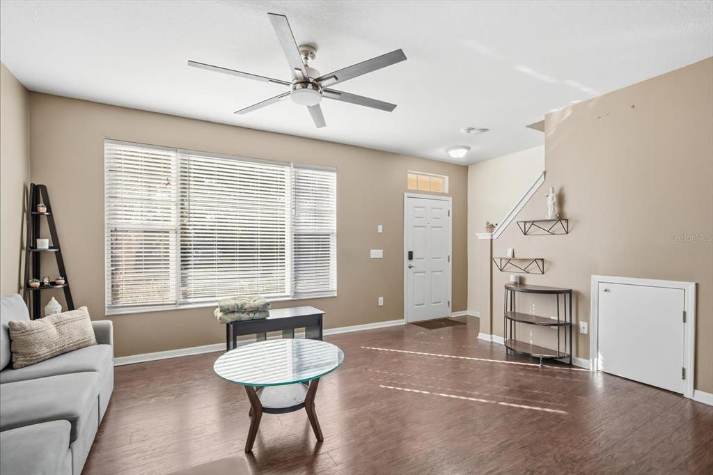 11008 Black Swan Court Seffner, FL 33584 - Photo 5 of 32 a living room with furniture and a large window