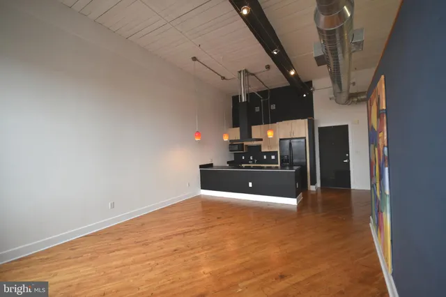 a view of a living room with a sink
