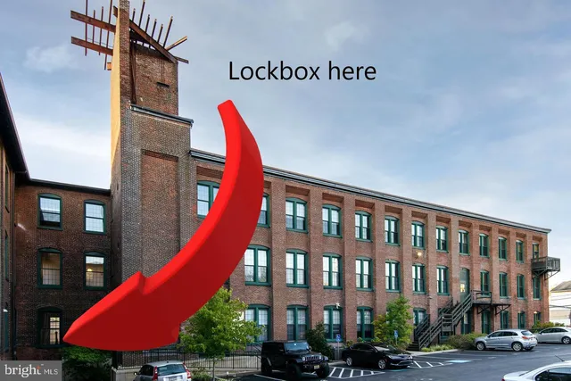 a view of a building with a yard