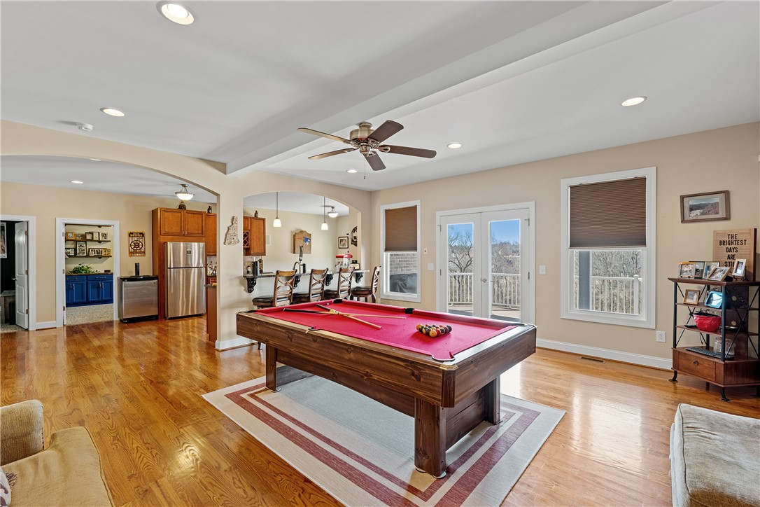 119 Turnberry Road Anderson, SC 29621 - Photo 29 of 50 An inviting open-concept area featuring rich hardwood floors and abundant natural light.
