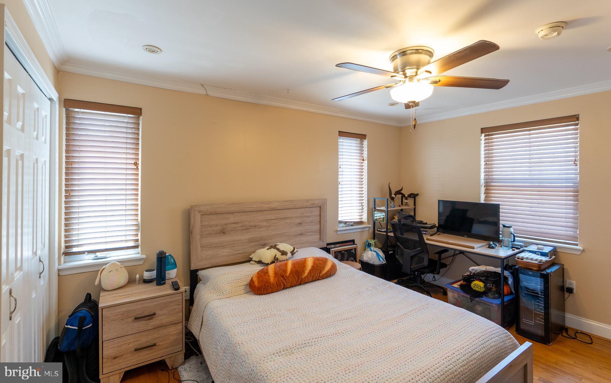 1108 Fitzwater Street Philadelphia, PA 19147 - Photo 15 of 25 a bedroom with a bed and a desk