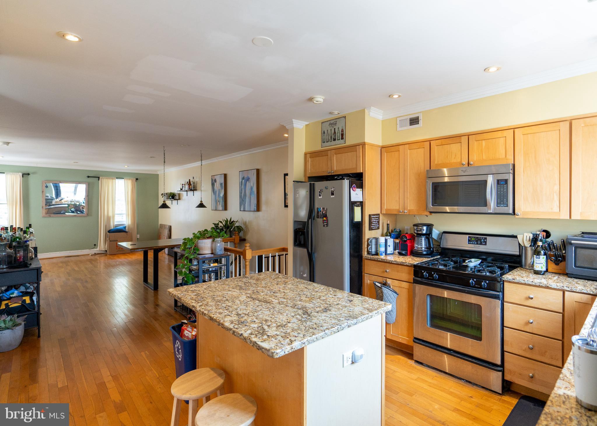 1108 Fitzwater Street Philadelphia, PA 19147 - Photo 5 of 25 a kitchen with stainless steel appliances granite countertop a stove and refrigerator