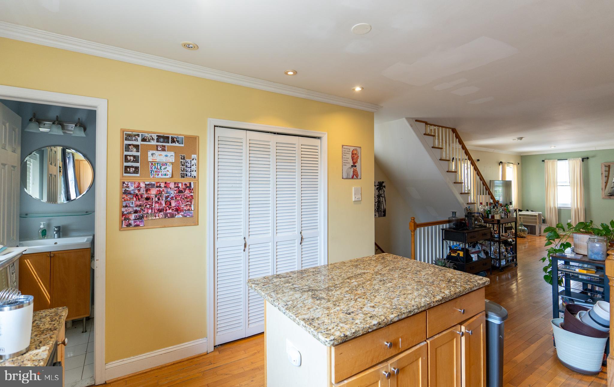 1108 Fitzwater Street Philadelphia, PA 19147 - Photo 6 of 25 a view of a hallway with wooden floor and furniture