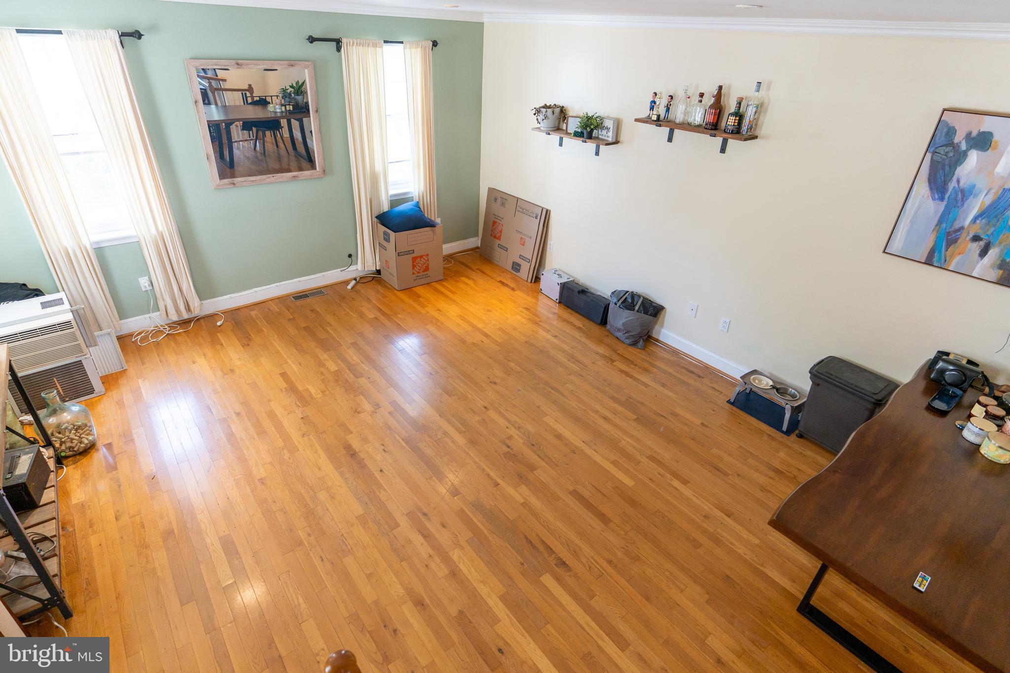 1108 Fitzwater Street Philadelphia, PA 19147 - Photo 9 of 25 a bedroom with a bed and wooden floor