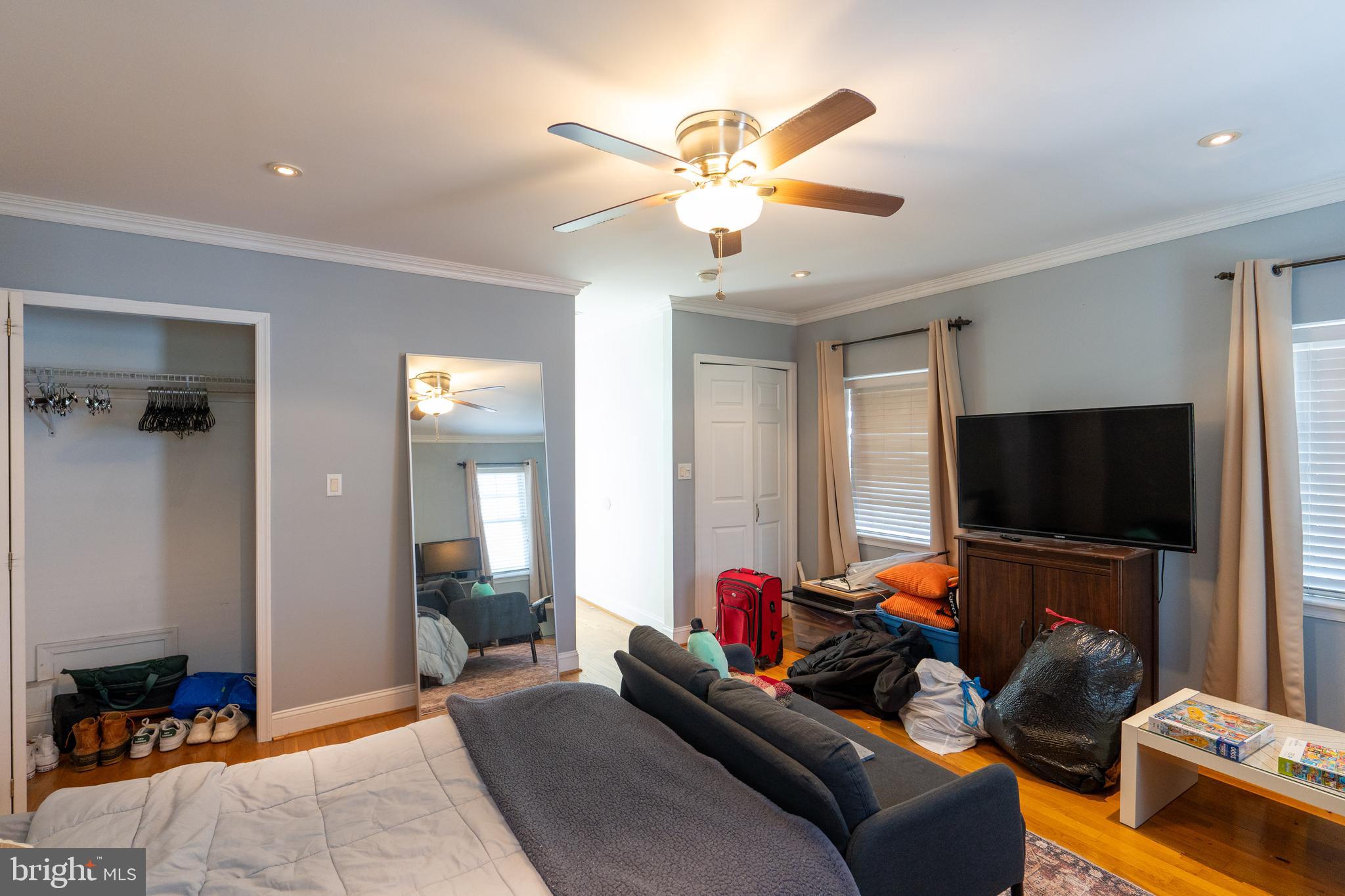 1108 Fitzwater Street Philadelphia, PA 19147 - Photo 10 of 25 a living room with furniture and a flat screen tv