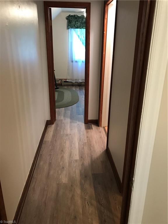 7517 Everson Road Summerfield, NC 27358 - Photo 13 of 15 Upper level Hallway New Laminate