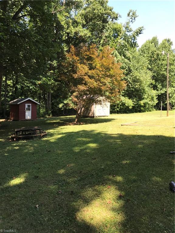 7517 Everson Road Summerfield, NC 27358 - Photo 4 of 15 Backyard Side View