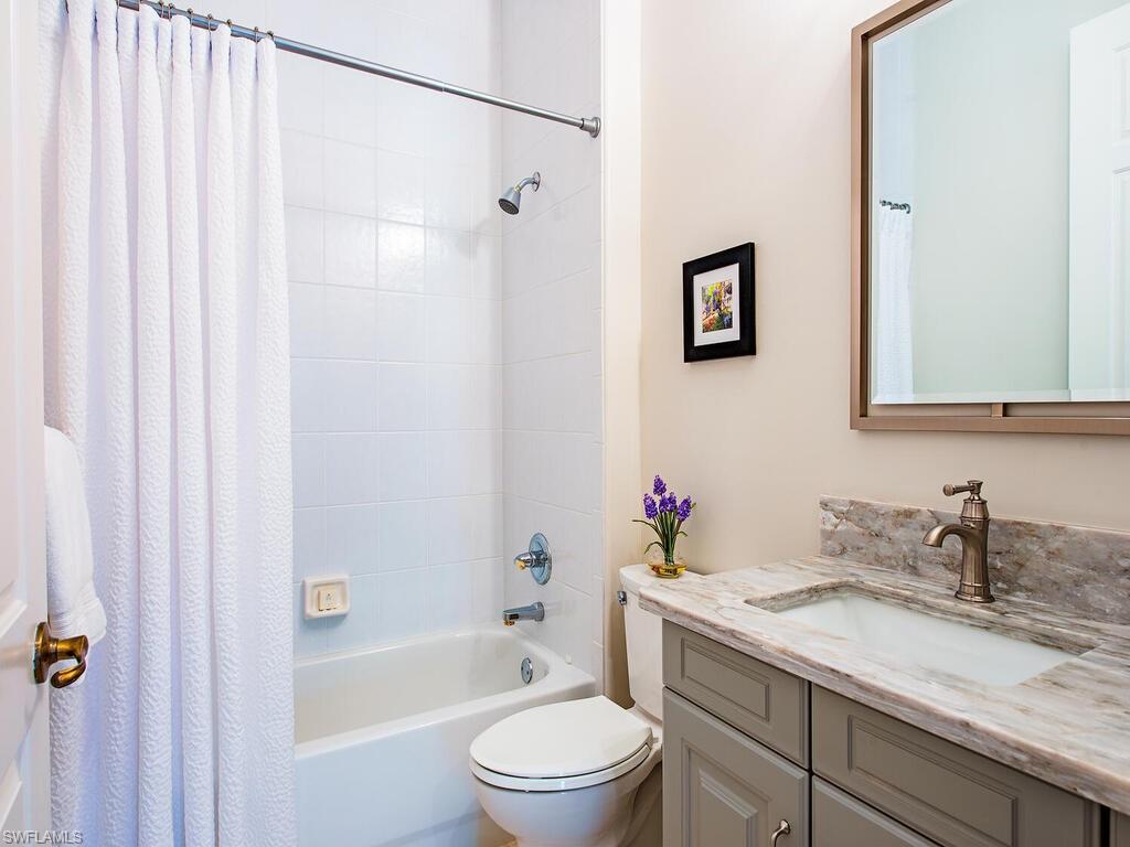 840 Regency Reserve Court, Unit 4 Naples, FL 34119 - Photo 13 of 24 Bathroom 3
