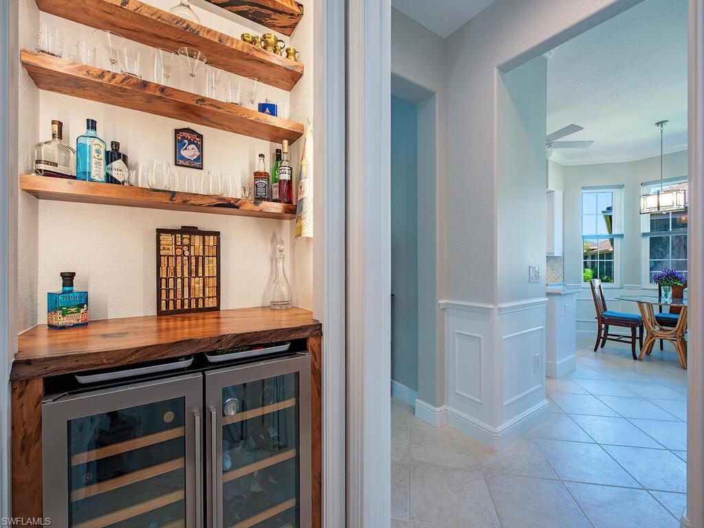 840 Regency Reserve Court, Unit 4 Naples, FL 34119 - Photo 5 of 24 Built in bar/beverage