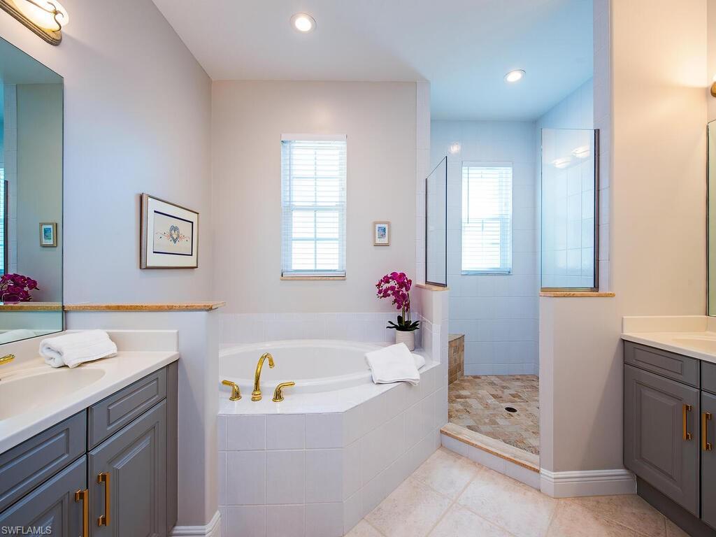 840 Regency Reserve Court, Unit 4 Naples, FL 34119 - Photo 8 of 24 Ensuite Owner's Bath