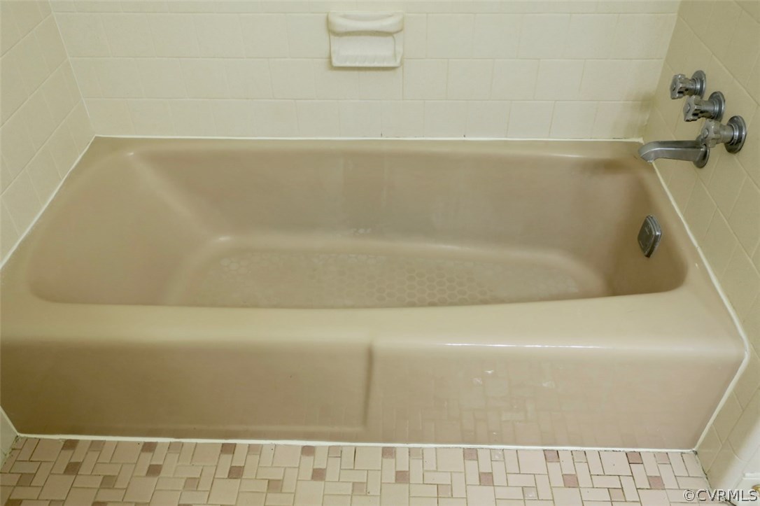 1218 Courthouse Road North Chesterfield, VA 23236 - Photo 24 of 30 a close view of a bathtub in bathroom