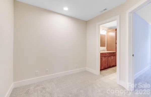 a view of a room with a hallway