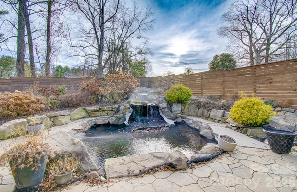 a backyard of a house with lots of green space
