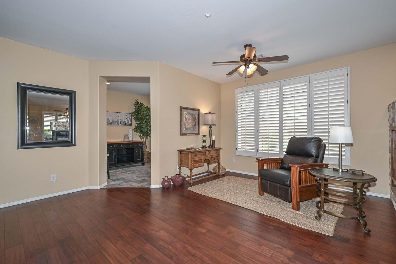 41418 North Clear Crossing Road Anthem, AZ 85086 - Photo 11 of 43 a view of a livingroom with workspace and a window