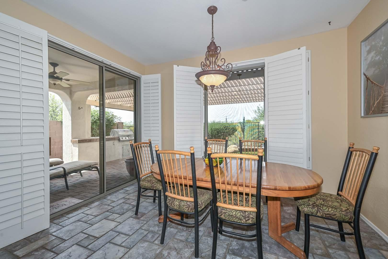 41418 North Clear Crossing Road Anthem, AZ 85086 - Photo 23 of 43 a view of a dining room with furniture window and outside view