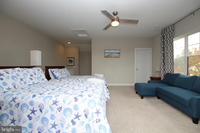 a view of a balcony with furniture