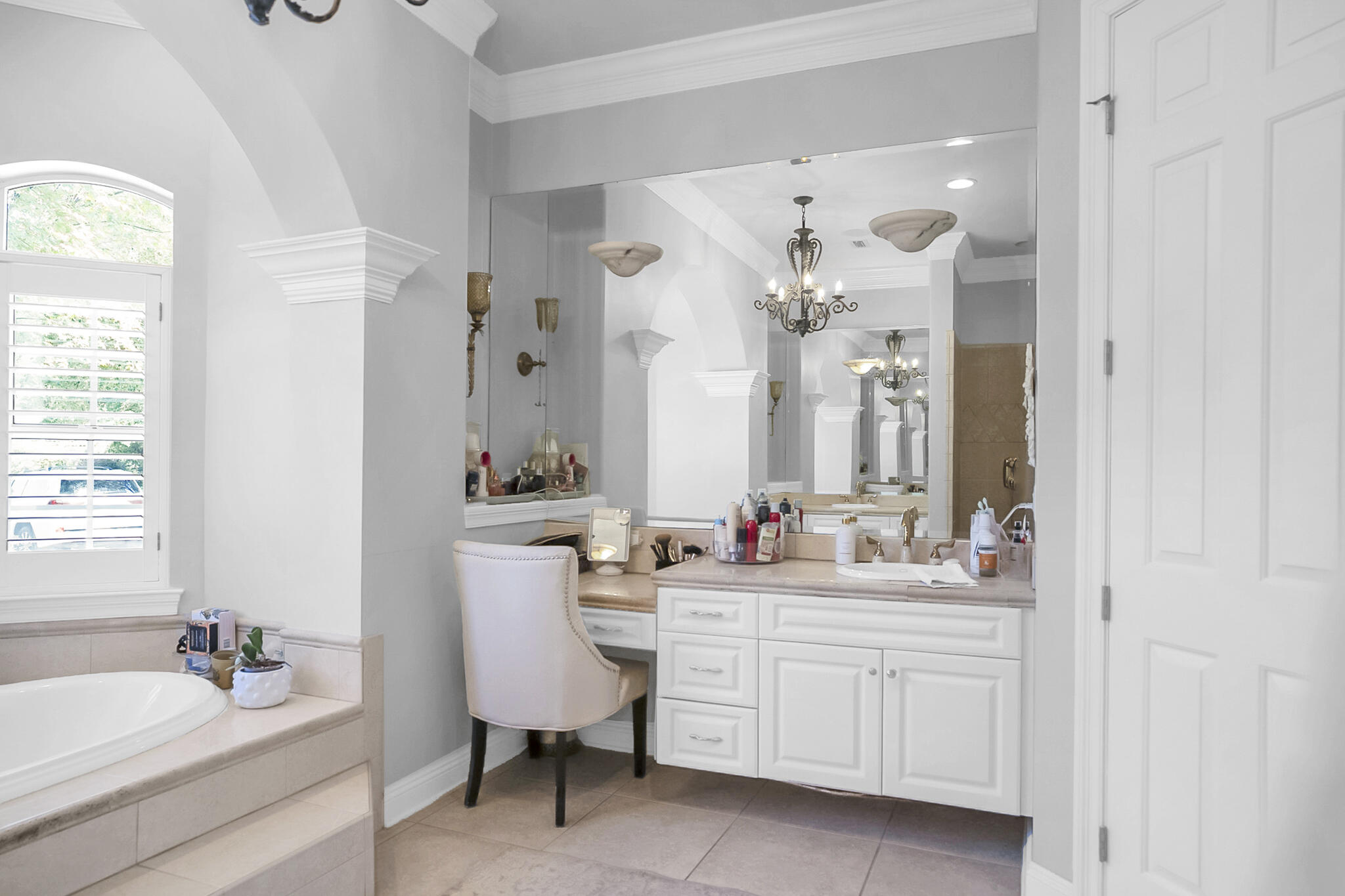 4372 Stonebridge Road Destin, FL 32541 - Photo 27 of 83 a bathroom with a double vanity sink mirror and bathtub