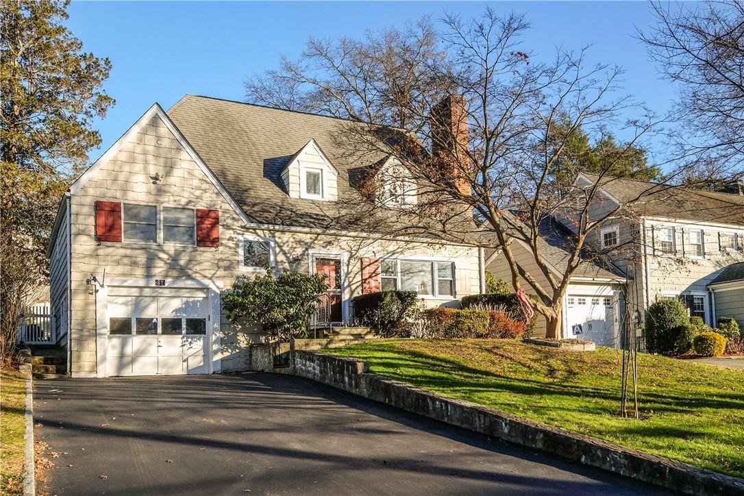 81 Tamarack Road Rye Brook, NY 10573 - Photo 1 of 1 a view of a house with a yard
