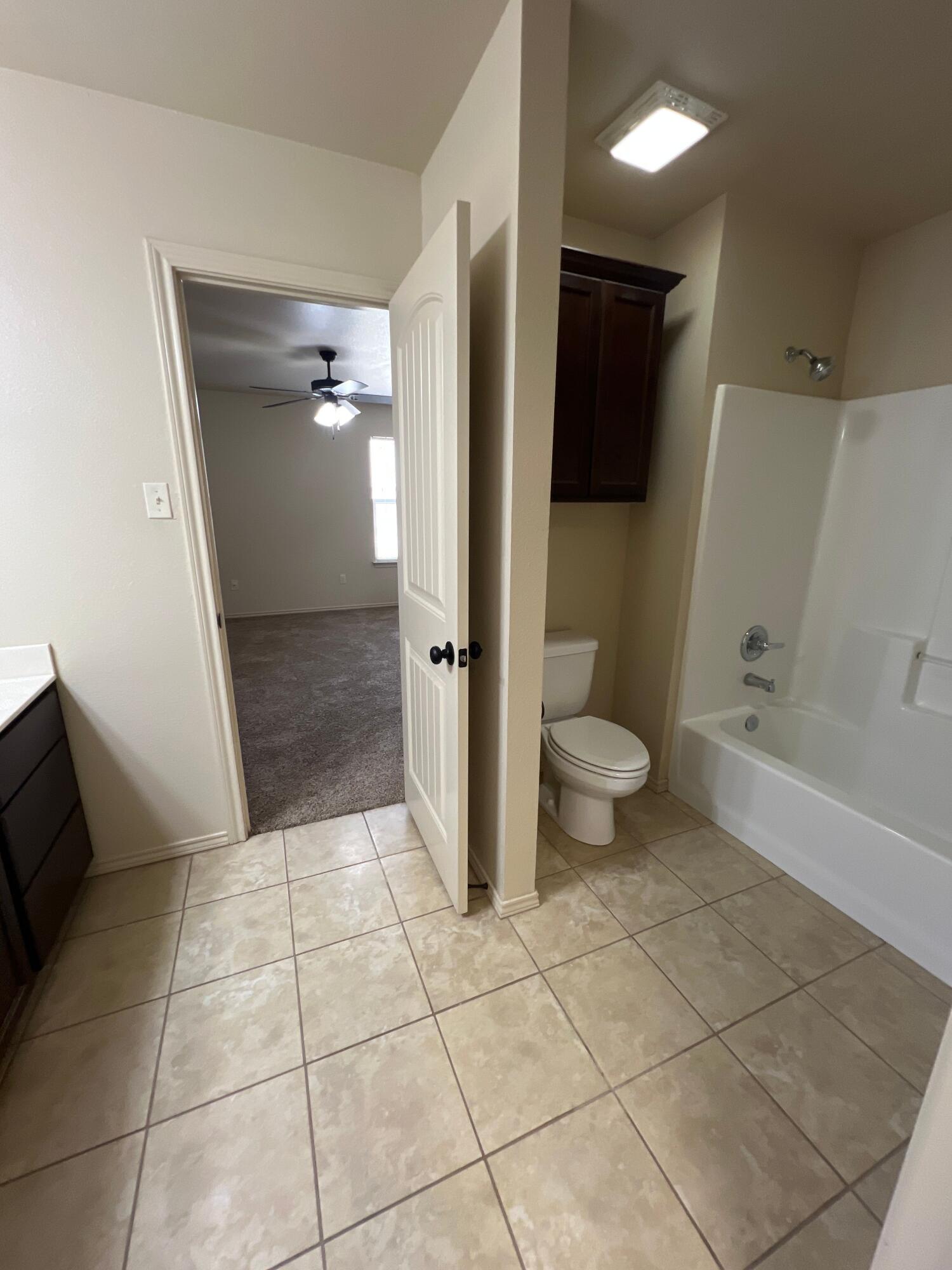 3204 112th Street Lubbock, TX 79423 - Photo 10 of 13 Primary Bath