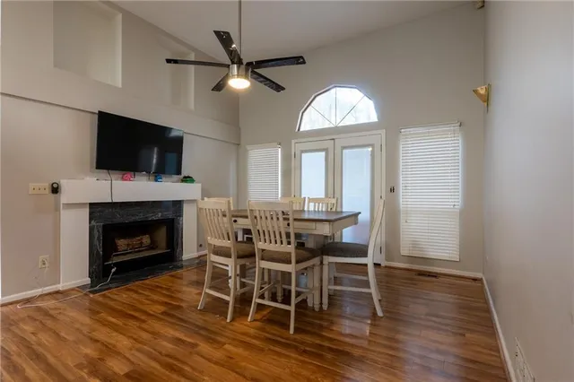 a view of a livingroom with furniture and a fireplace