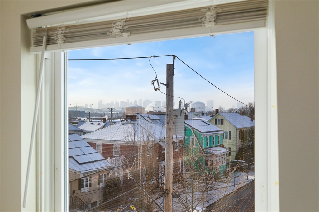 41 Wolcott Street, Unit 5 Everett, MA 02149 - Photo 20 of 22 a view of a balcony with wooden floor