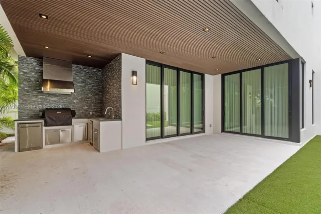 a view of a backyard of a house