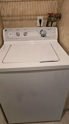 a close view of laundry room with washer and dryer