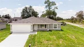 a house view with a garden space