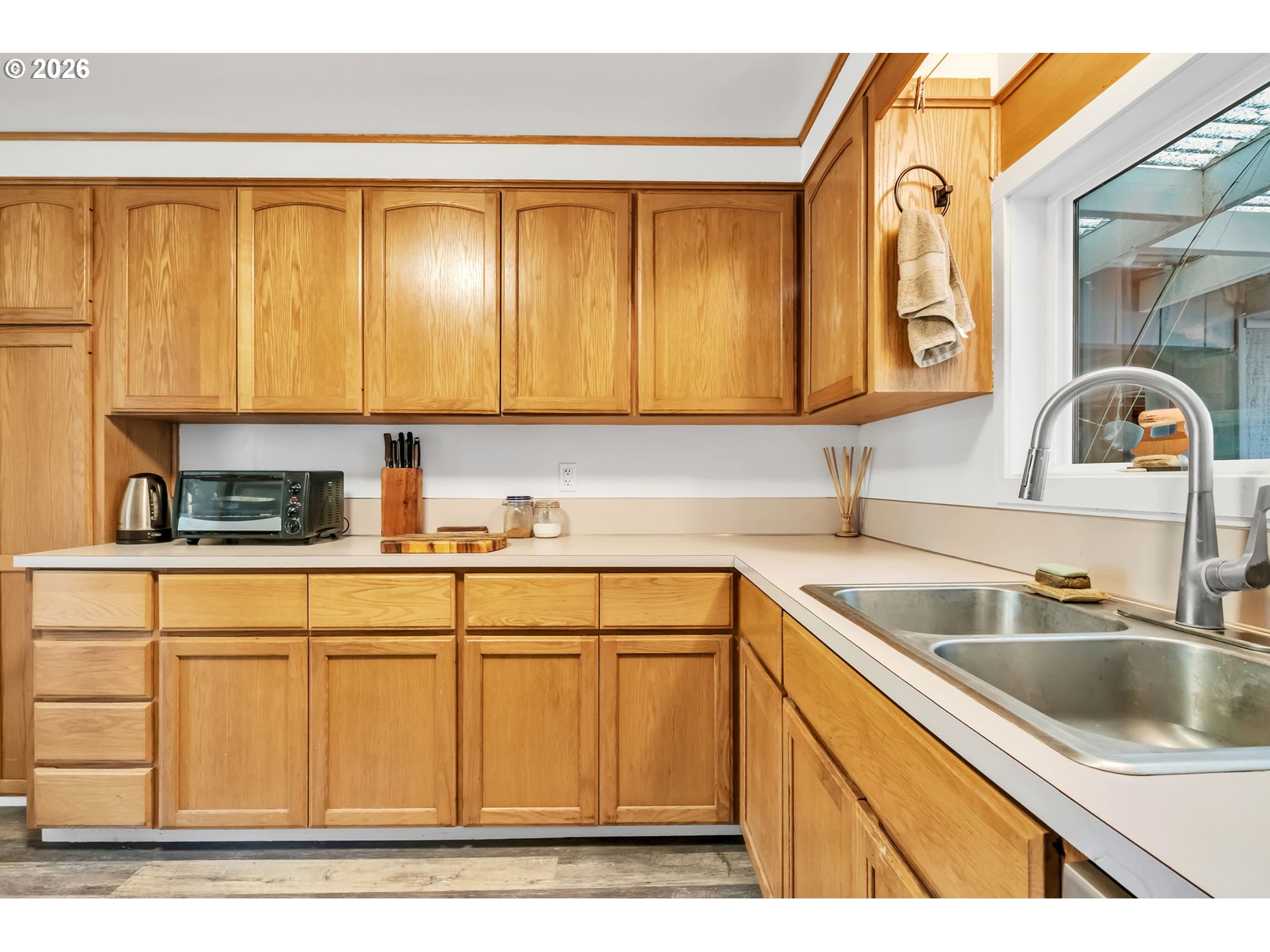 47576 Riverview Street Oakridge, OR 97463 - Photo 15 of 48 a kitchen with a sink cabinets and a sink