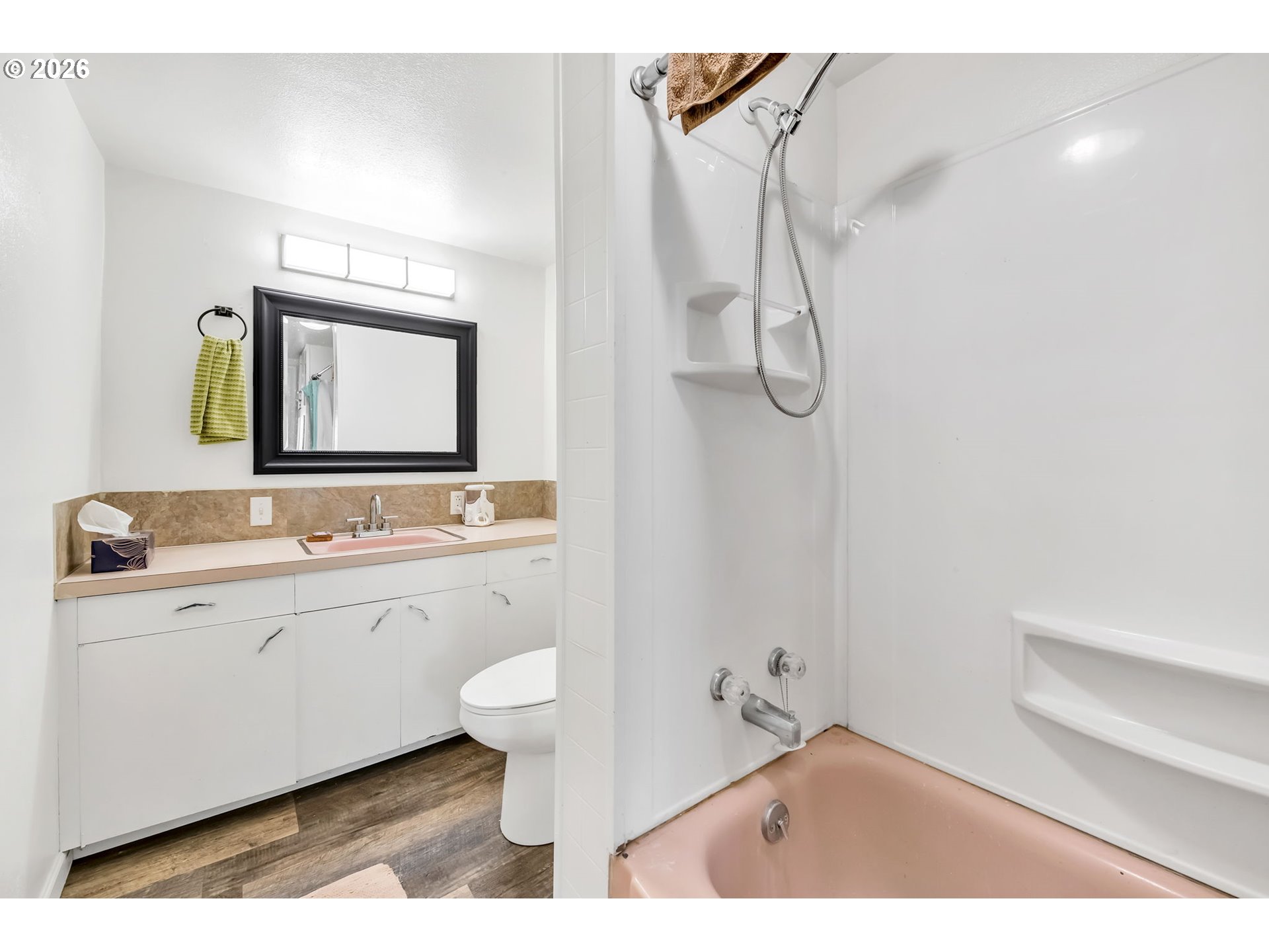 47576 Riverview Street Oakridge, OR 97463 - Photo 22 of 48 a bathroom with a sink a toilet and a mirror