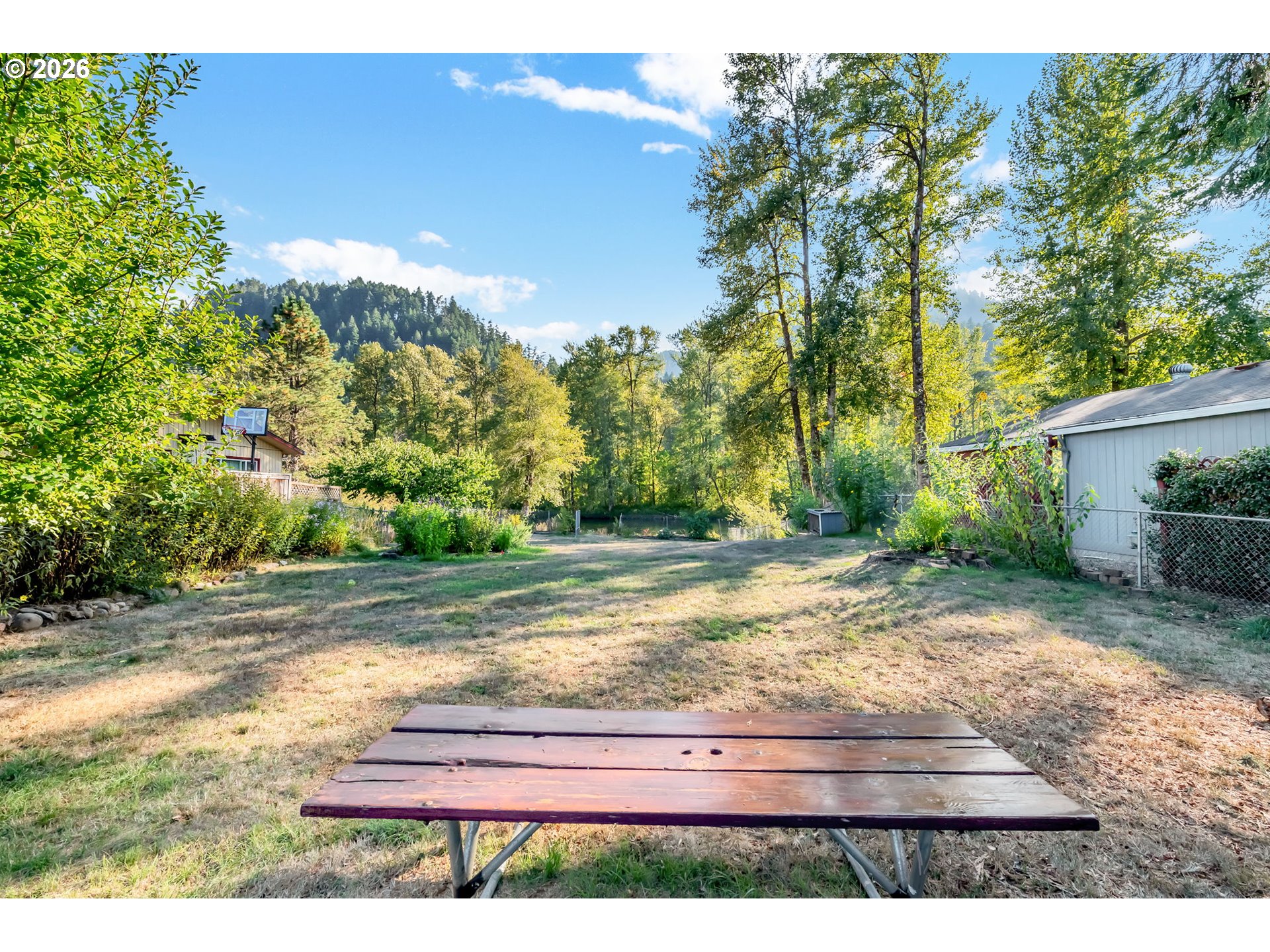 47576 Riverview Street Oakridge, OR 97463 - Photo 35 of 48 a view of backyard with green space