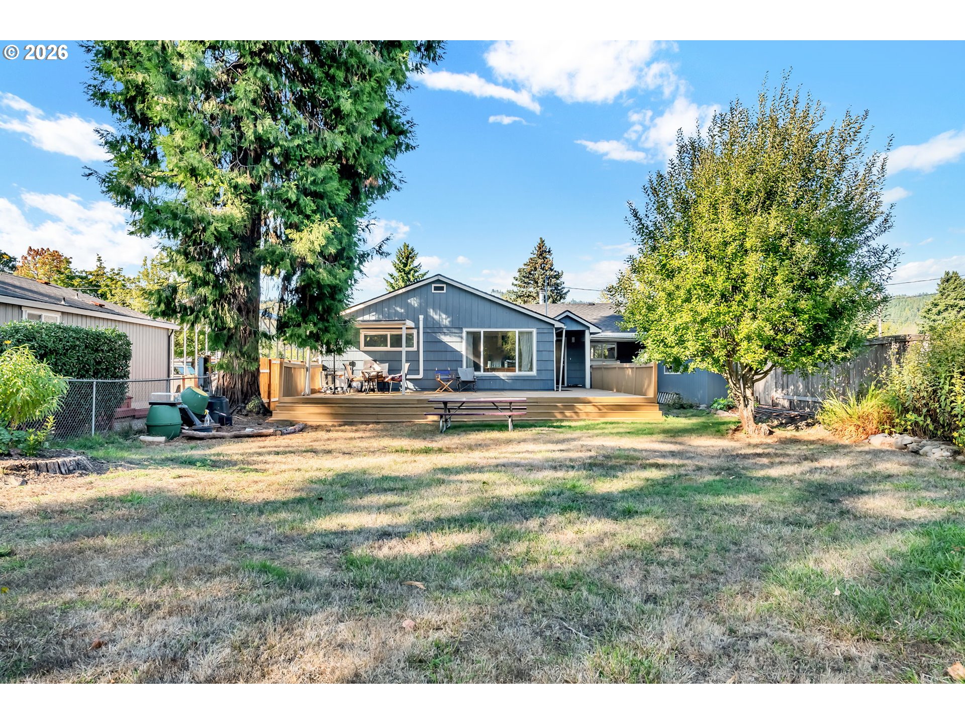 47576 Riverview Street Oakridge, OR 97463 - Photo 38 of 48 a front view of a house with a garden