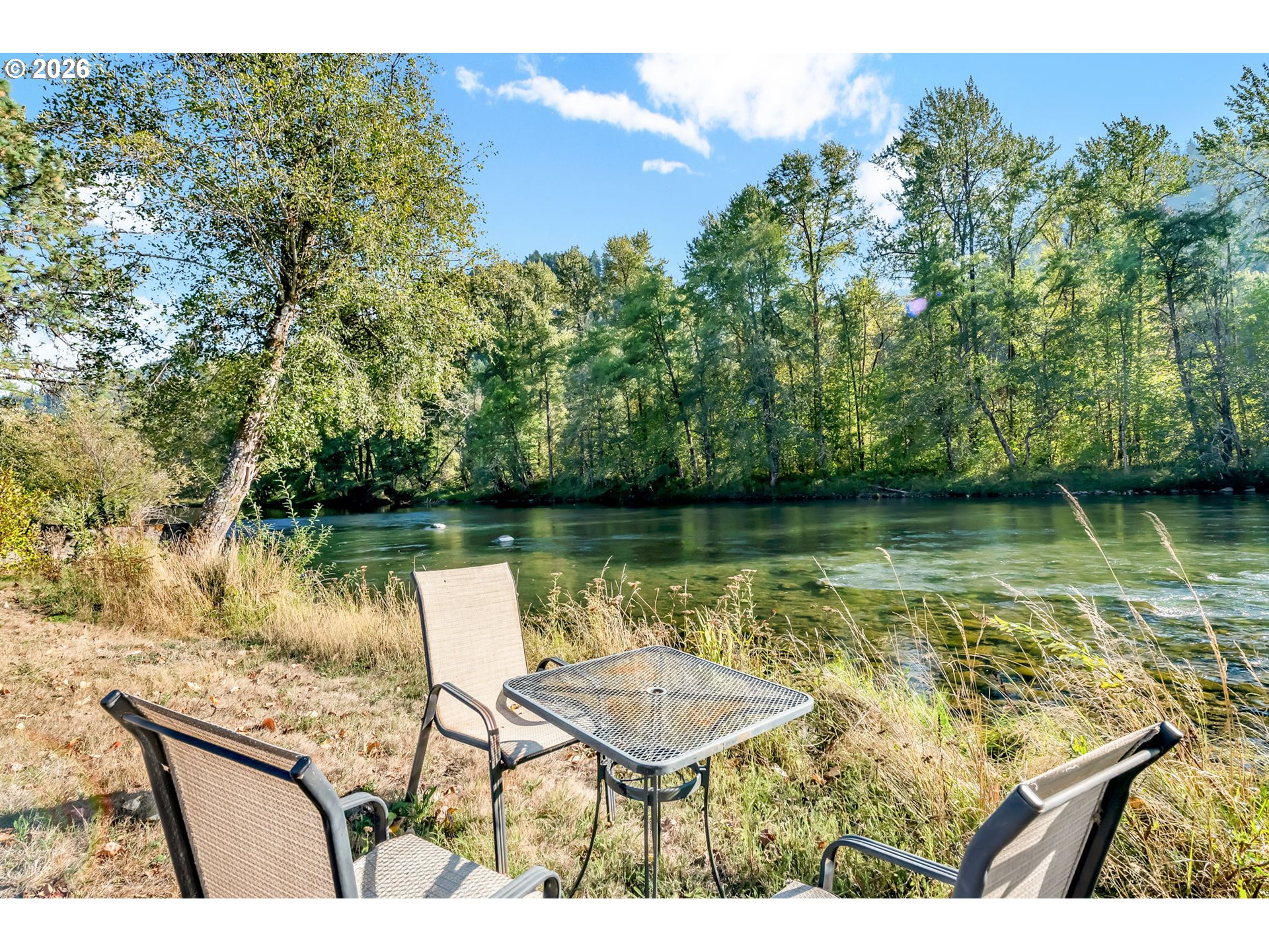 47576 Riverview Street Oakridge, OR 97463 - Photo 42 of 48 a view of a lake with a outdoor space