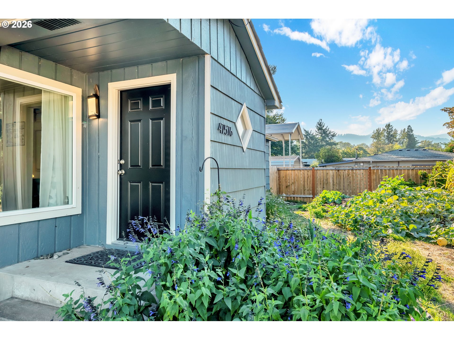 47576 Riverview Street Oakridge, OR 97463 - Photo 5 of 48 a view of a house with a plants
