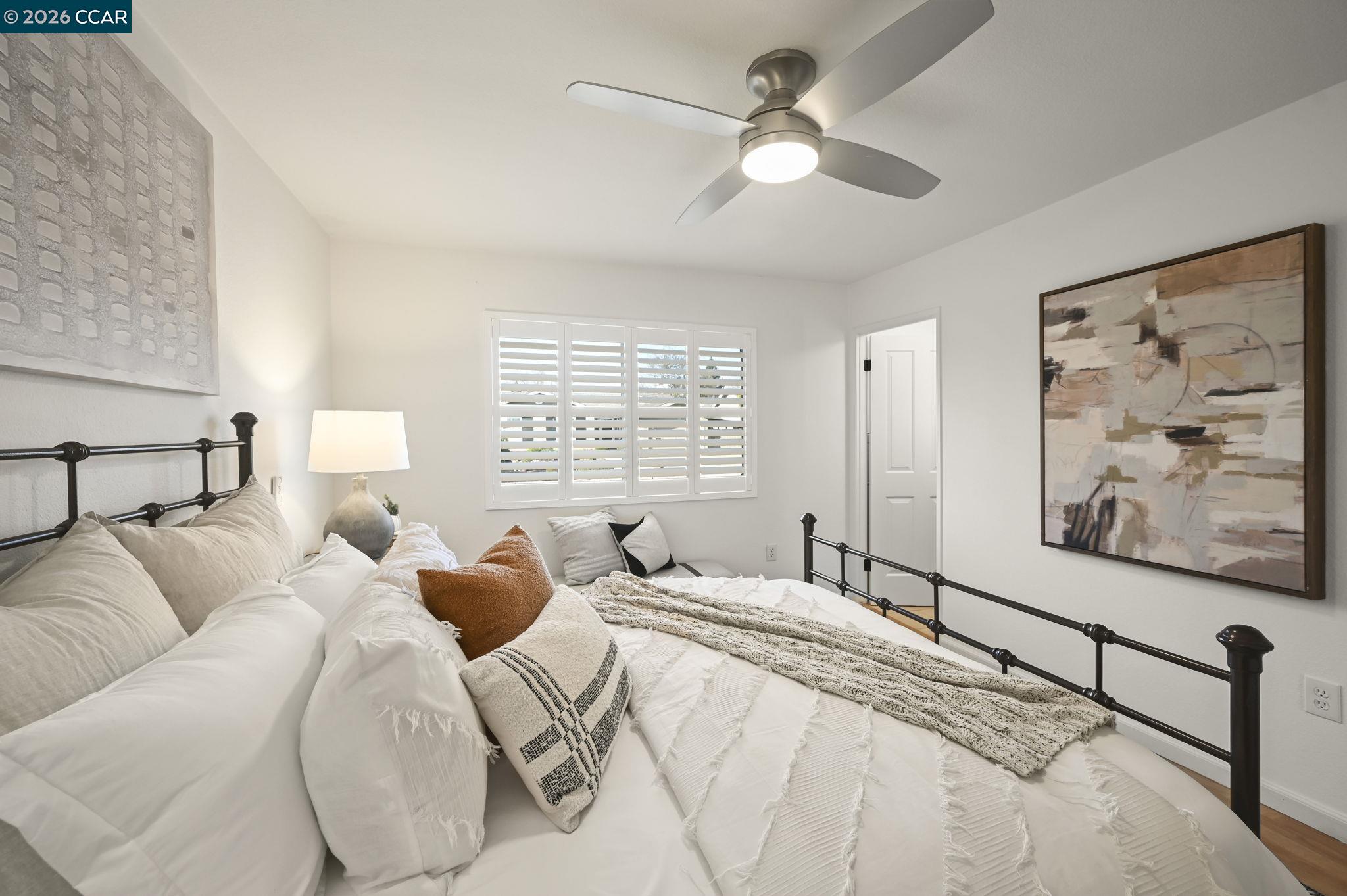 118 Neptune Place San Ramon, CA 94583 - Photo 16 of 36 a bedroom with a bed and a painting on the wall